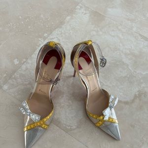 Christian Louboutin heels.